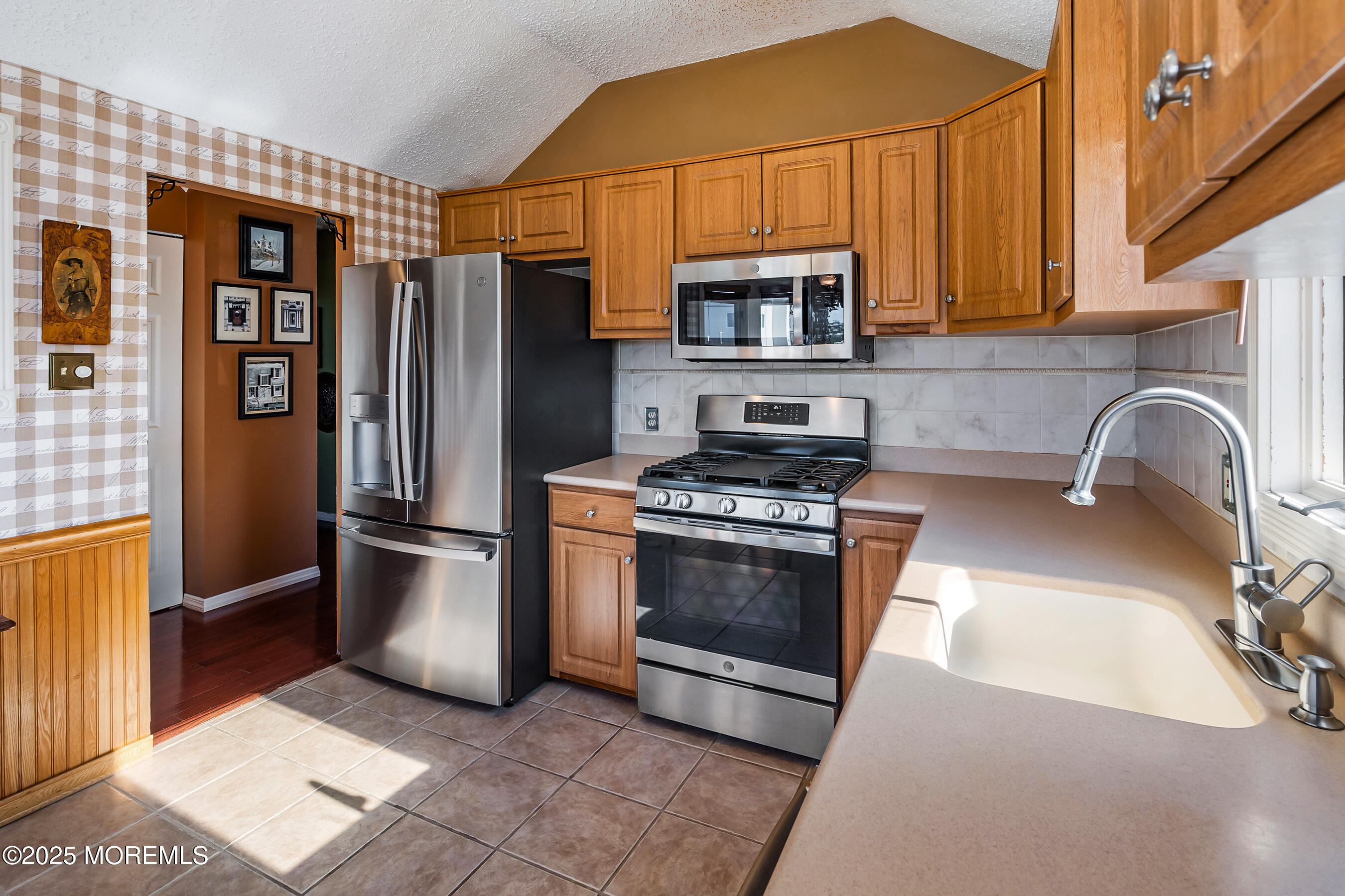 5 Beach Drive Little Egg Harbor, NJ 08087 - Photo 11 of 47 a kitchen with stainless steel appliances granite countertop a refrigerator stove and sink