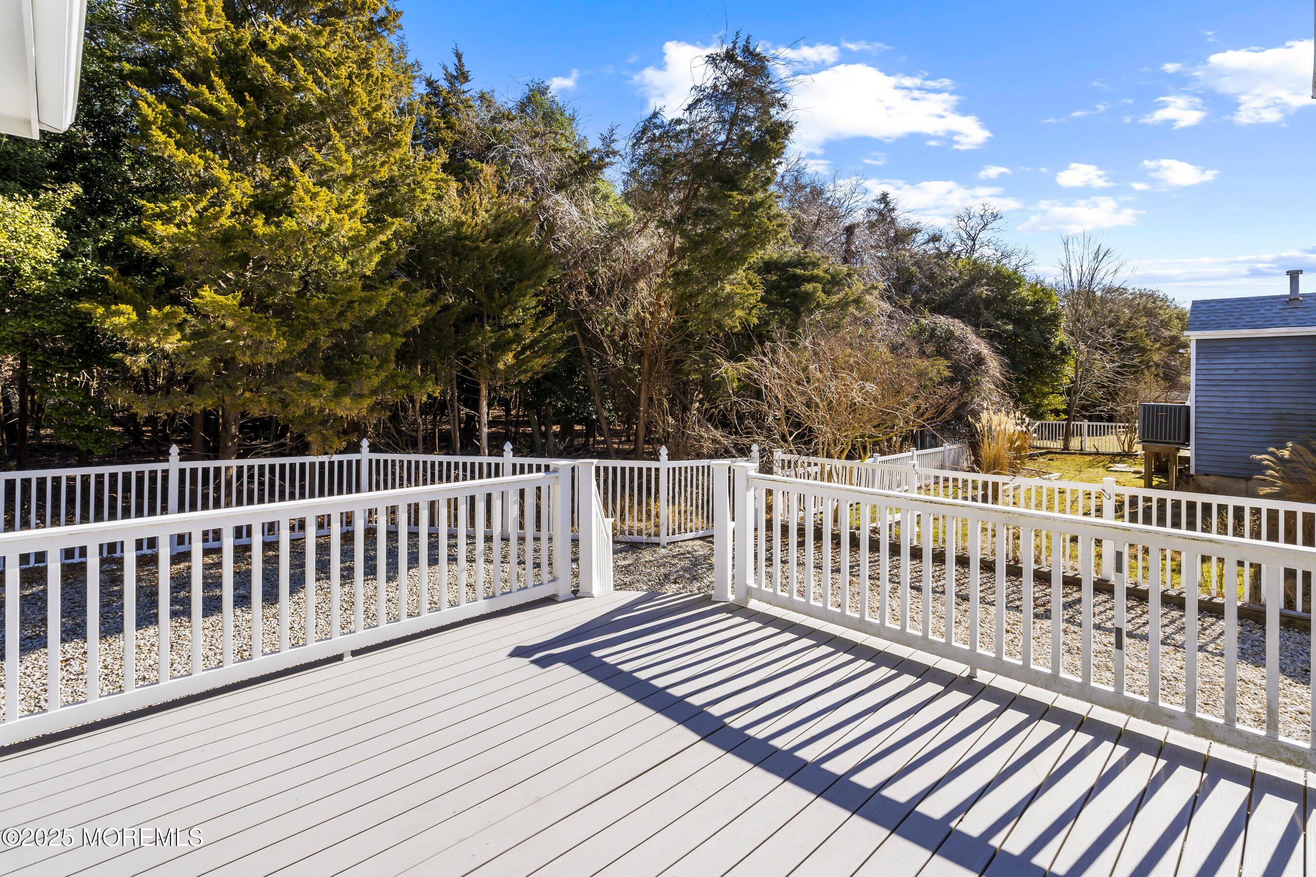 5 Beach Drive Little Egg Harbor, NJ 08087 - Photo 34 of 47 a view of a wooden roof deck