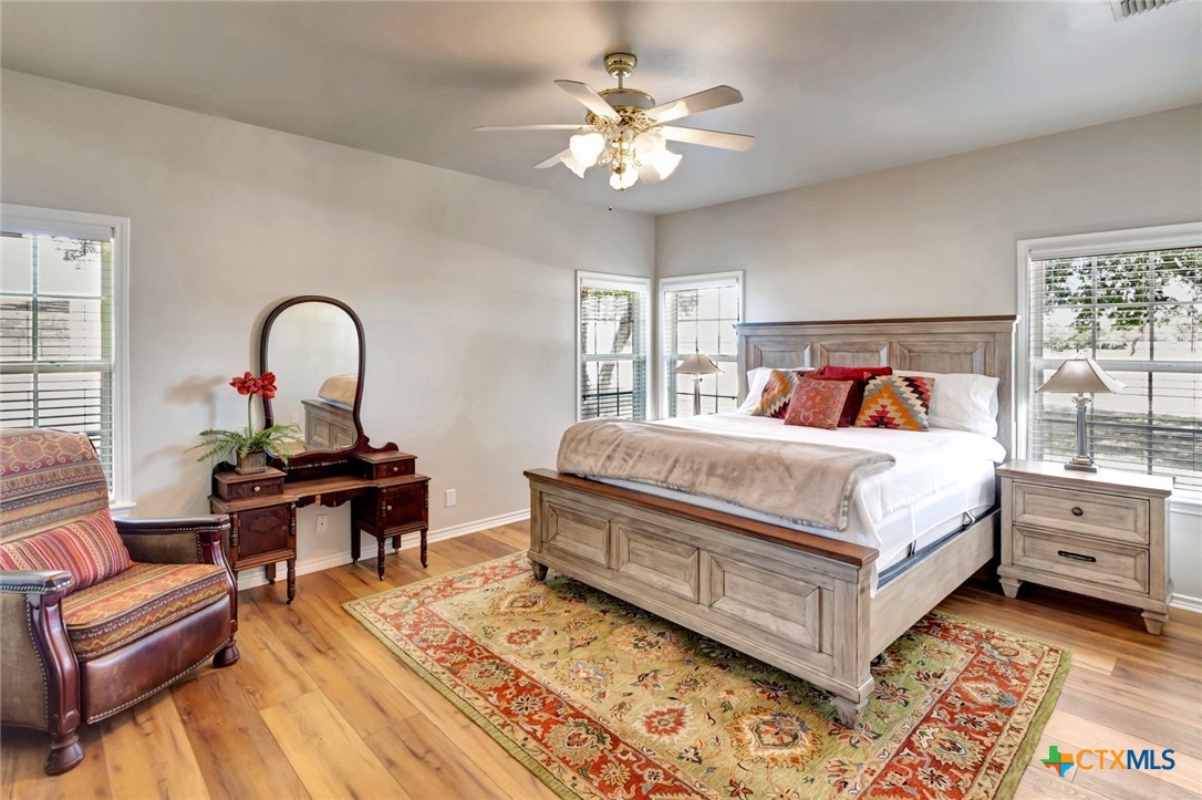 202 Prairie View Road Victoria, TX 77904 - Photo 15 of 47 a bedroom with a bed and a dresser
