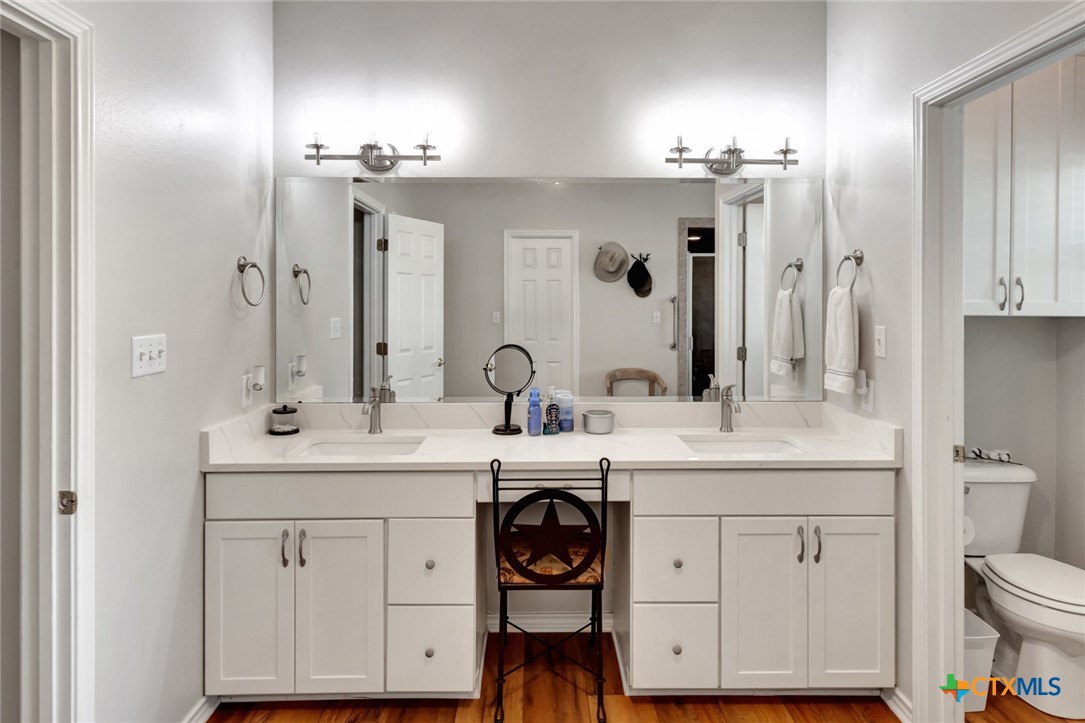 202 Prairie View Road Victoria, TX 77904 - Photo 17 of 47 a spacious bathroom with a sink double vanity and a mirror