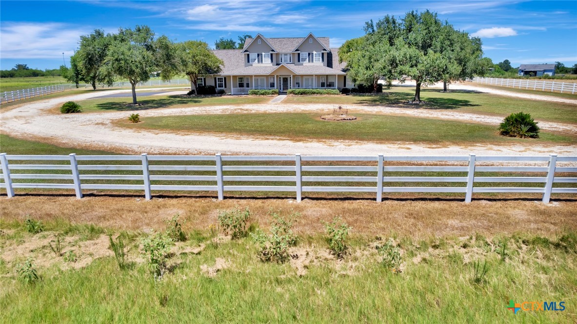 202 Prairie View Road Victoria, TX 77904 - Photo 2 of 47 a view of yard with swimming pool and green space