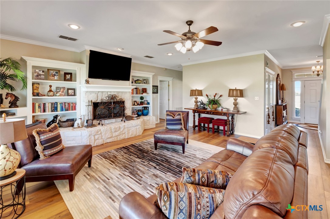 202 Prairie View Road Victoria, TX 77904 - Photo 7 of 47 a living room with furniture and a flat screen tv