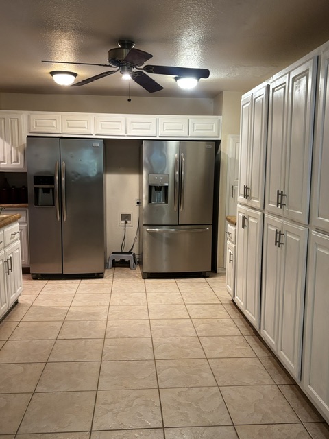 12883 Nickels Road West Fork, AR 72774 - Photo 10 of 26 Spacious kitchen featuring stainless steel appliances including side-by-side refrigerator, French-door refrigerator, and built-in ice maker