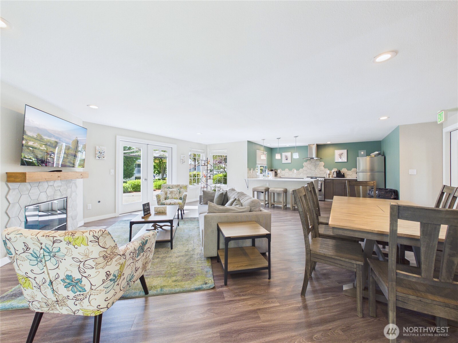 11002 Southeast Petrovitsky Road, Unit I102 Renton, WA 98055 - Photo 21 of 24 a living room with furniture and a wooden floor