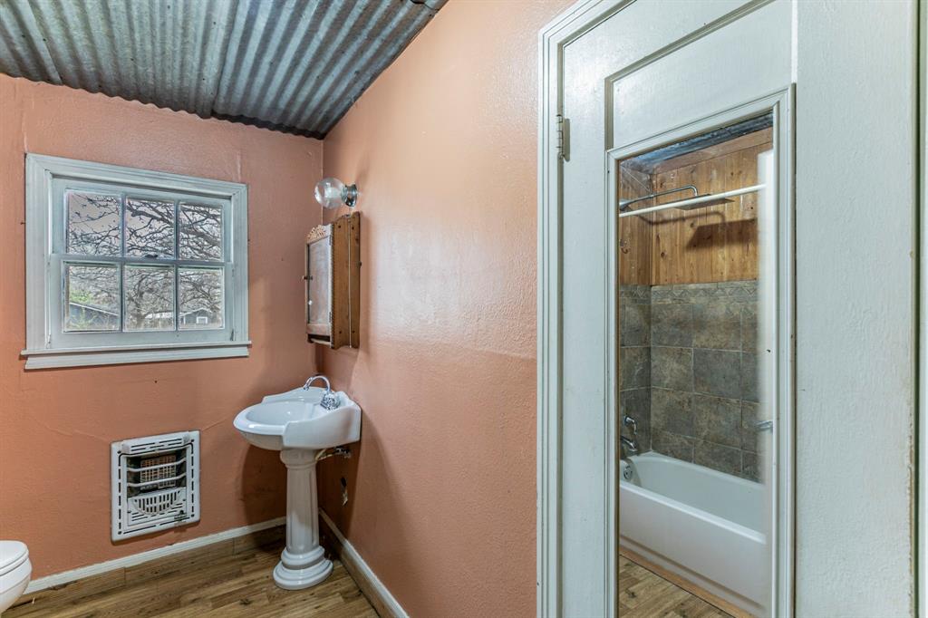 3320 Parrott Avenue Waco, TX 76707 - Photo 9 of 15 a bathroom with a shower