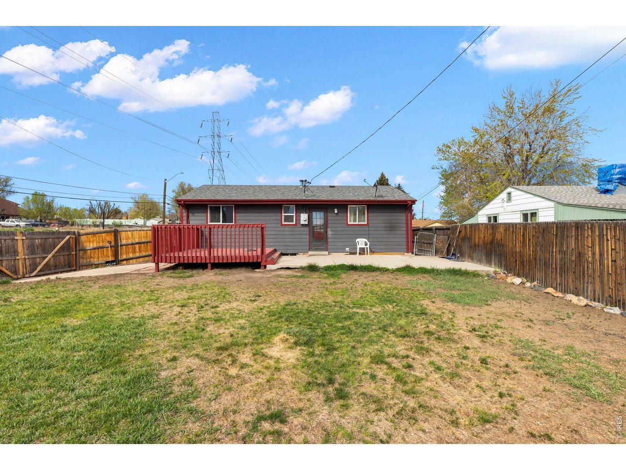 840 South Stuart Street Denver, CO 80219 - Photo 21 of 26 a view of a house with a yard