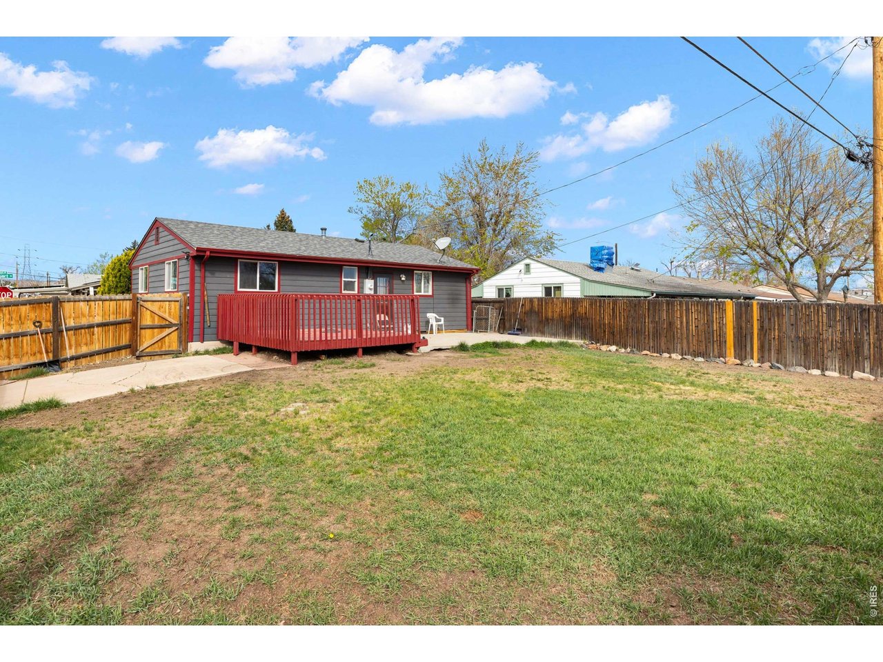 840 South Stuart Street Denver, CO 80219 - Photo 22 of 26 a view of a house with a yard
