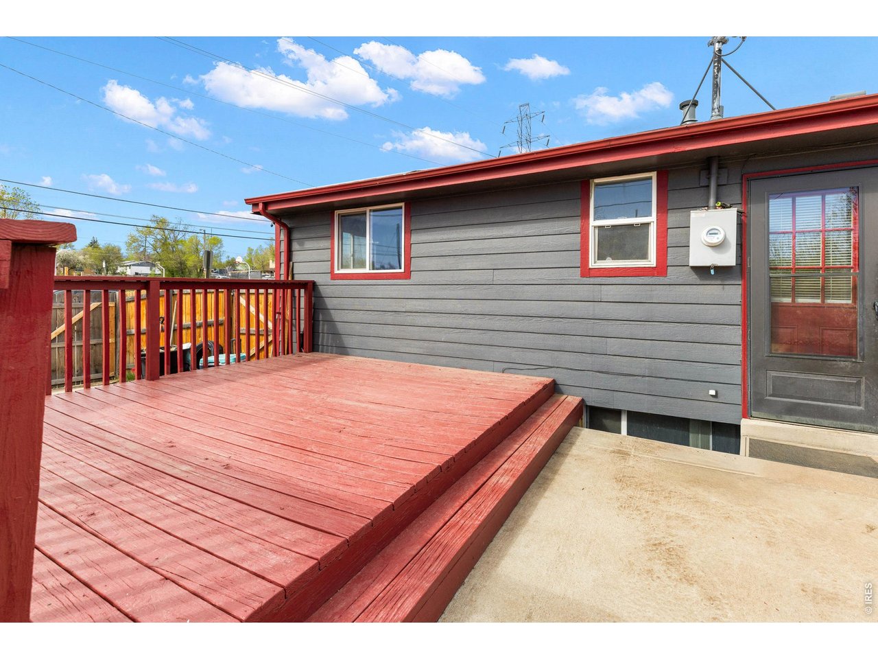 840 South Stuart Street Denver, CO 80219 - Photo 23 of 26 a backyard of a house with wooden deck