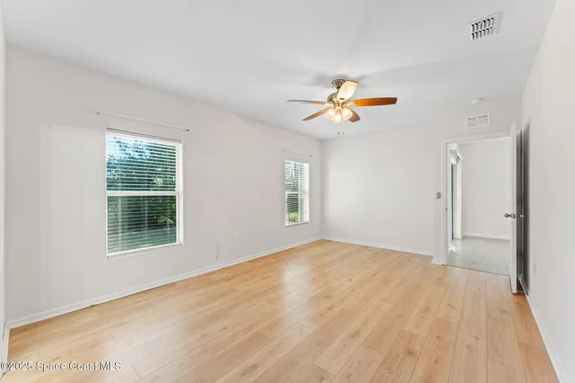 a view of a room with racks on the wall