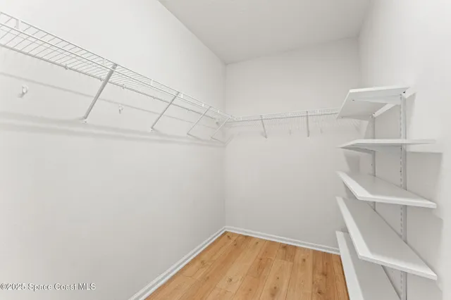 a bathroom with a sink double vanity and a mirror