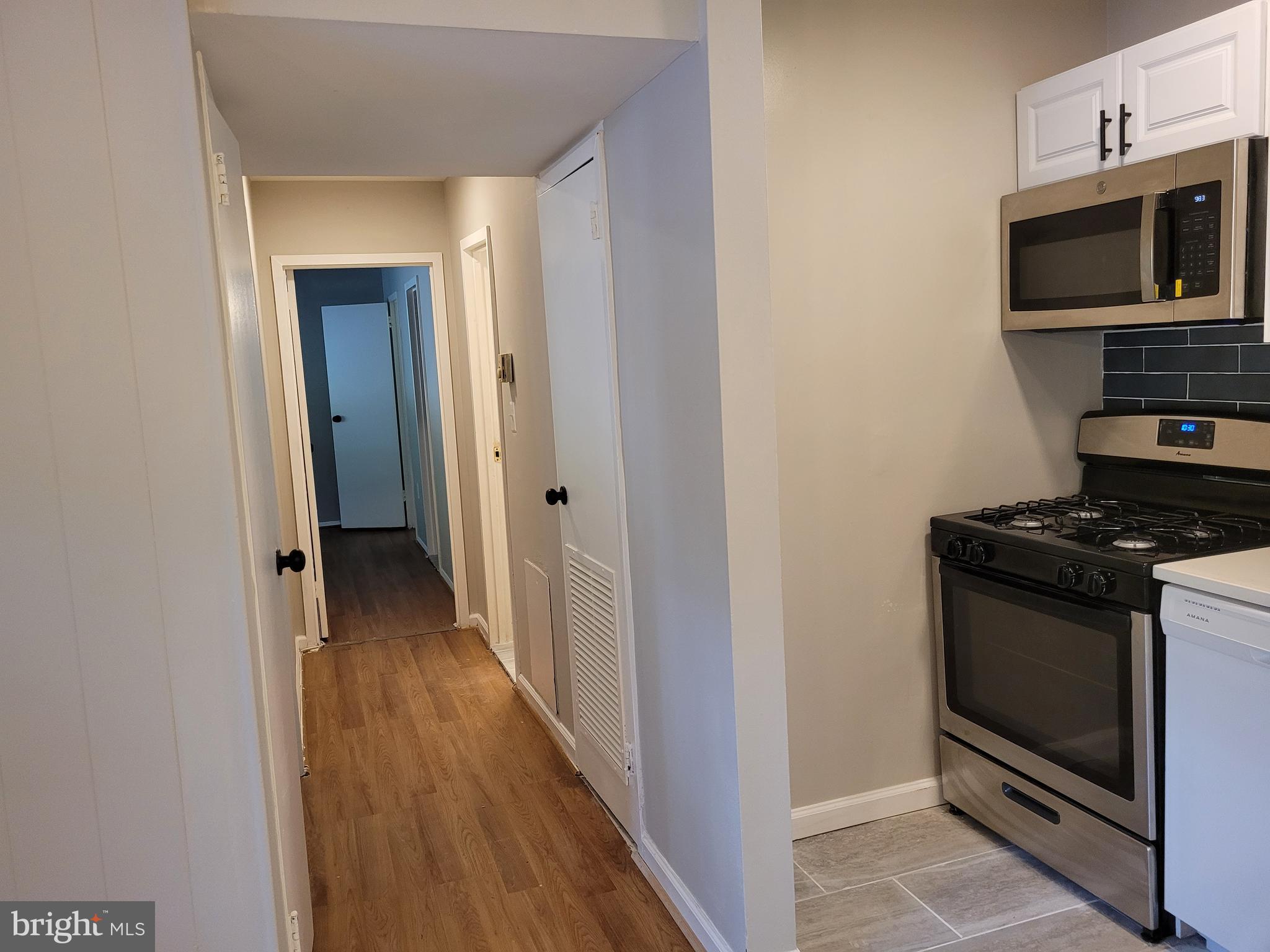 3854 Bel Pre Road, Unit 3 Silver Spring, MD 20906 - Photo 8 of 21 Hallway to bedroom/bathrooms