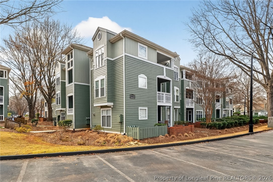 1221 Westview Lane, Unit 301 Raleigh, NC 27605 - Photo 2 of 32 a front view of a building with street view