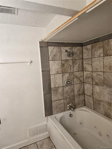 a bathroom with a bathtub