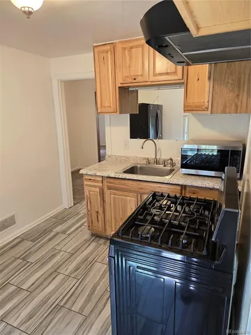 an empty room with a empty space and window