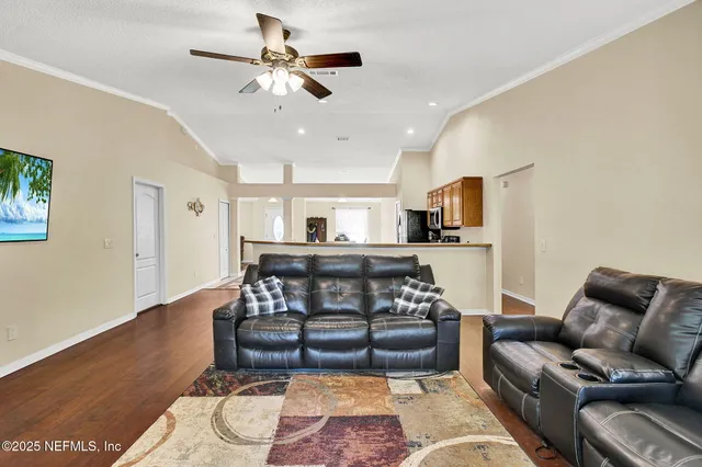 a view of a chairs and table in the patio