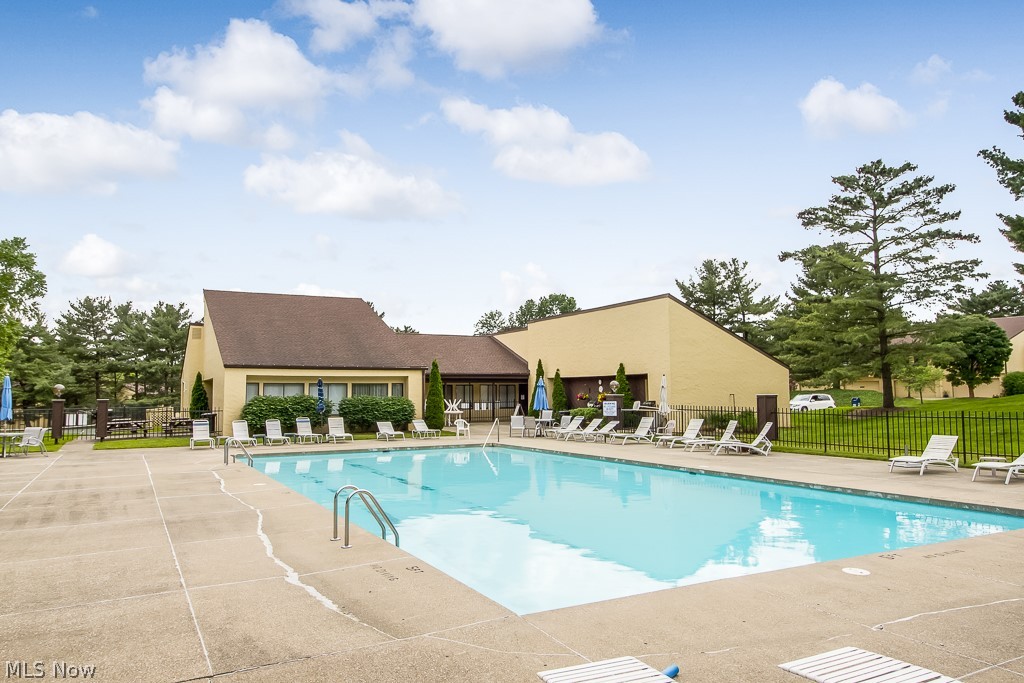 452 Hampton Ridge Drive Akron, OH 44313 - Photo 22 of 25 Enjoy summer poolside! The clubhouse and pool are just a few more perks of living in the desirable Hampton Woods neighborhood.
