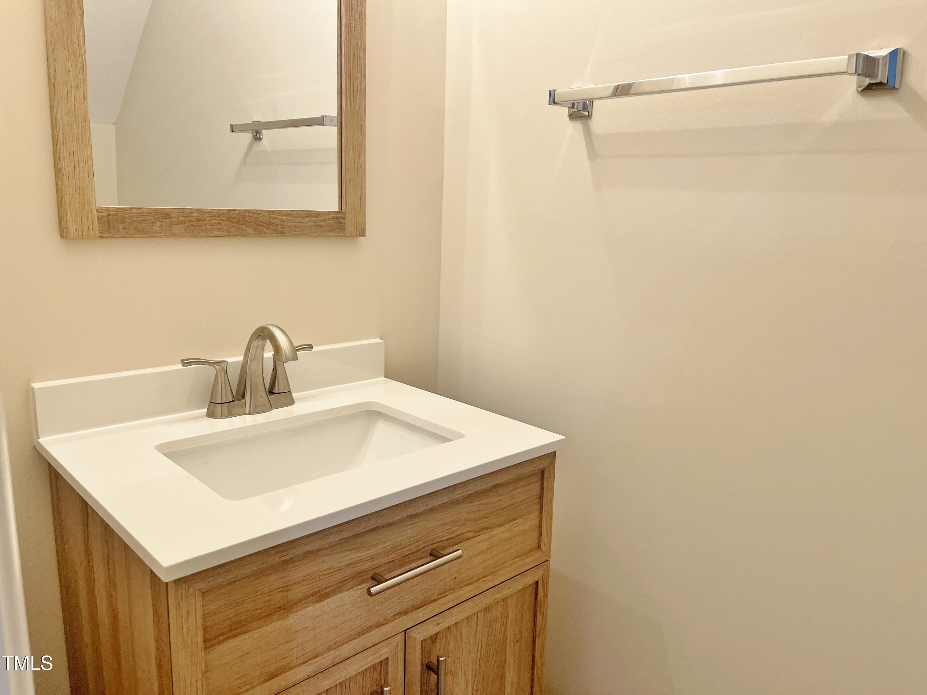 4315 Vienna Crest Drive Raleigh, NC 27613 - Photo 13 of 14 powder room