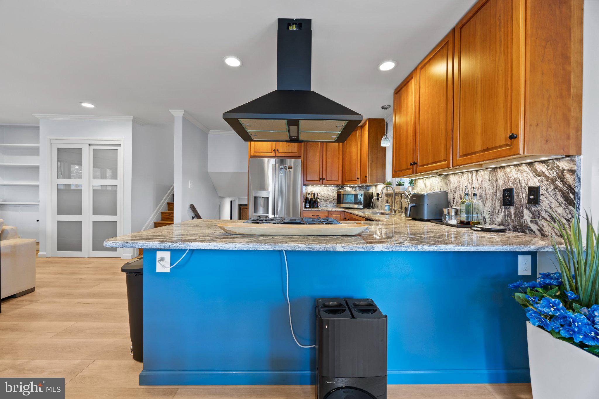 6705 New Hope Drive Springfield, VA 22151 - Photo 20 of 67 Modern kitchen with vibrant accents.