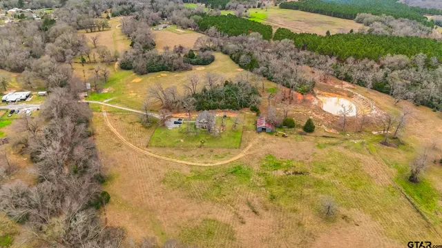 a view of swimming pool with a yard