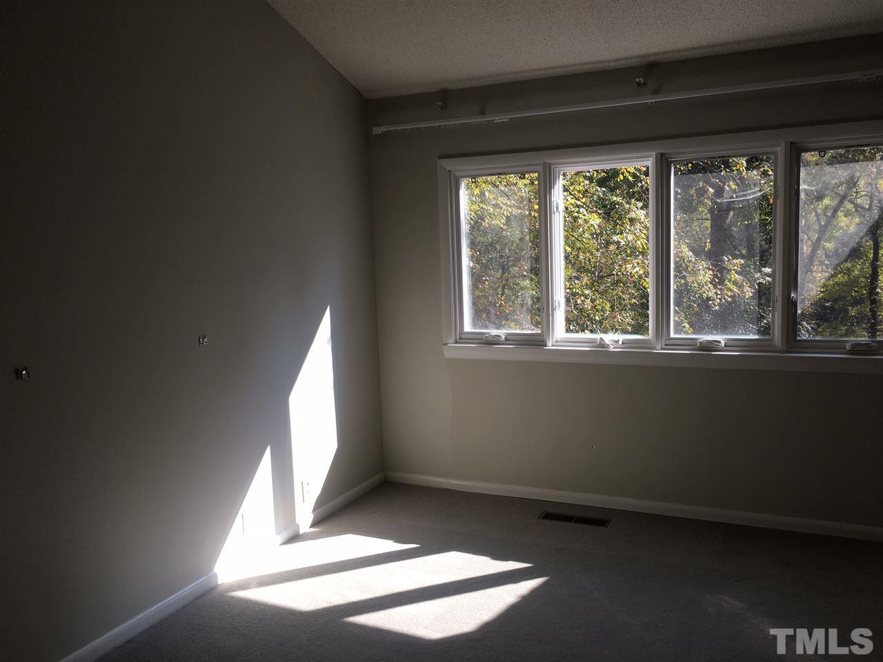 5401 Edington Lane Raleigh, NC 27604 - Photo 11 of 25 a view of empty room with large window