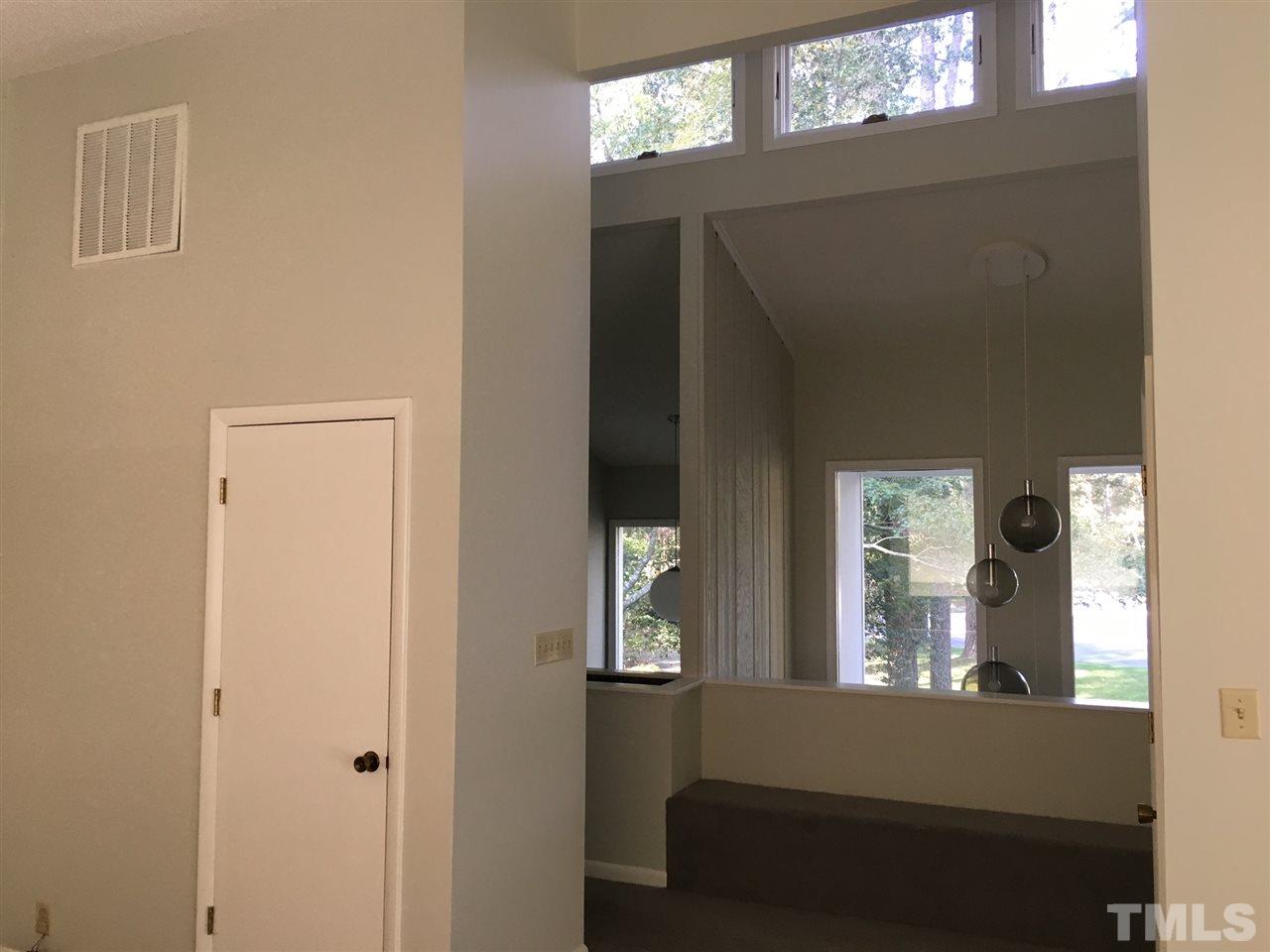 5401 Edington Lane Raleigh, NC 27604 - Photo 12 of 25 a living room with furniture and a window