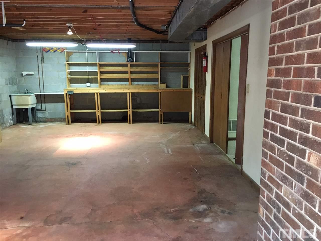 5401 Edington Lane Raleigh, NC 27604 - Photo 18 of 25 a view of an empty room with a house
