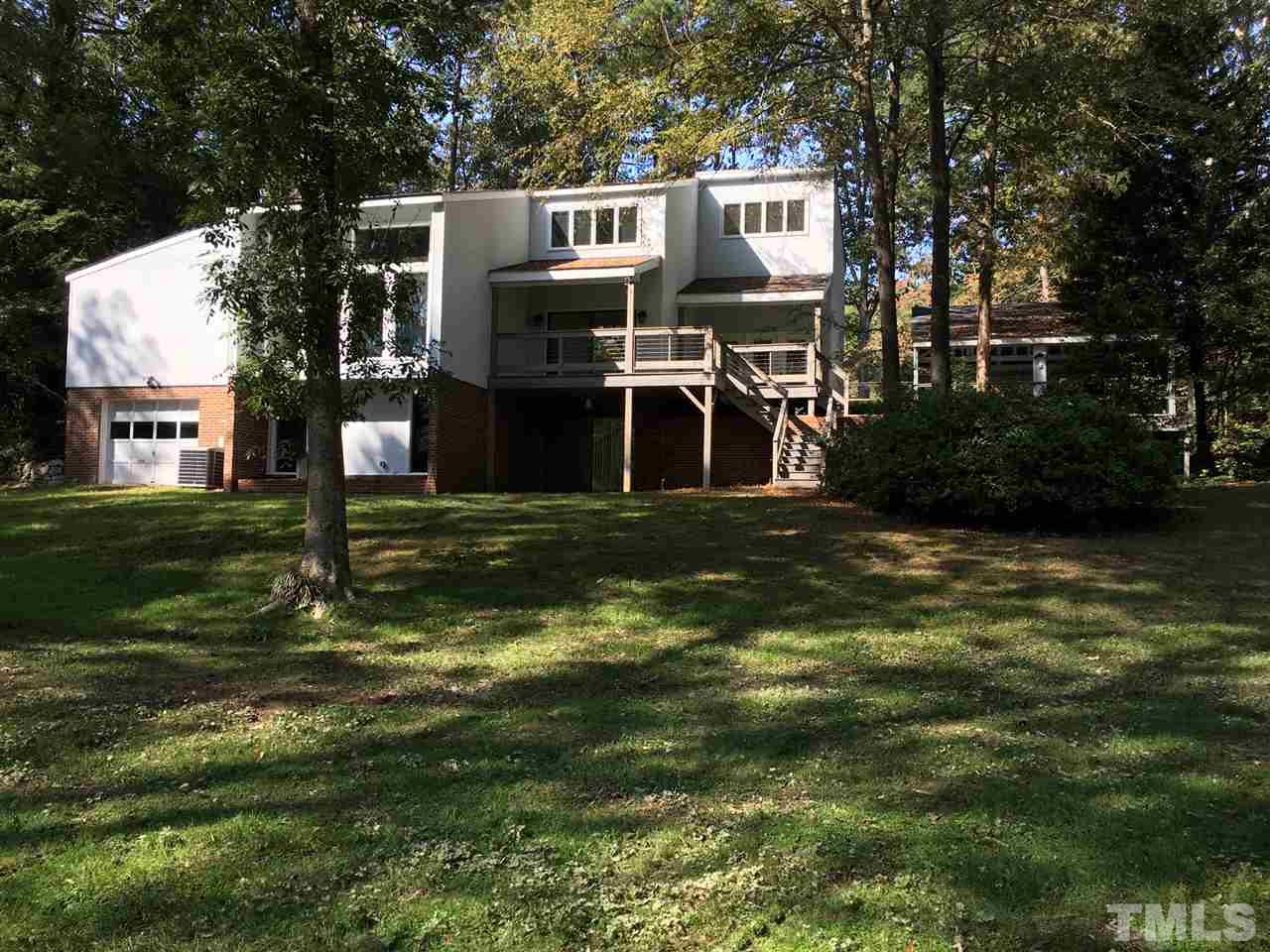 5401 Edington Lane Raleigh, NC 27604 - Photo 19 of 25 a front view of a house with a yard