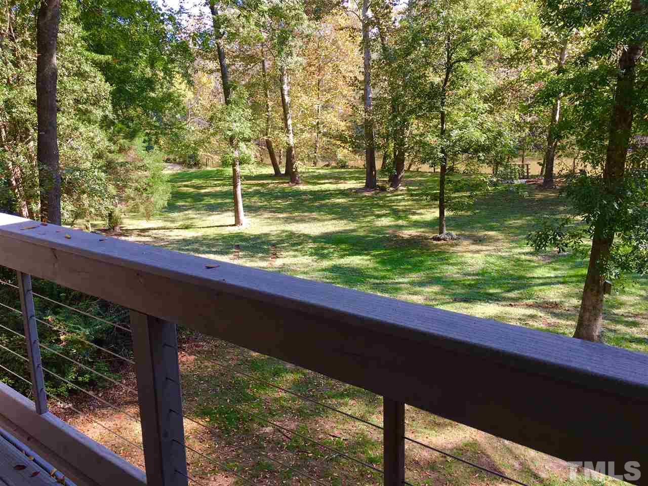 5401 Edington Lane Raleigh, NC 27604 - Photo 20 of 25 a view of a lake from a window