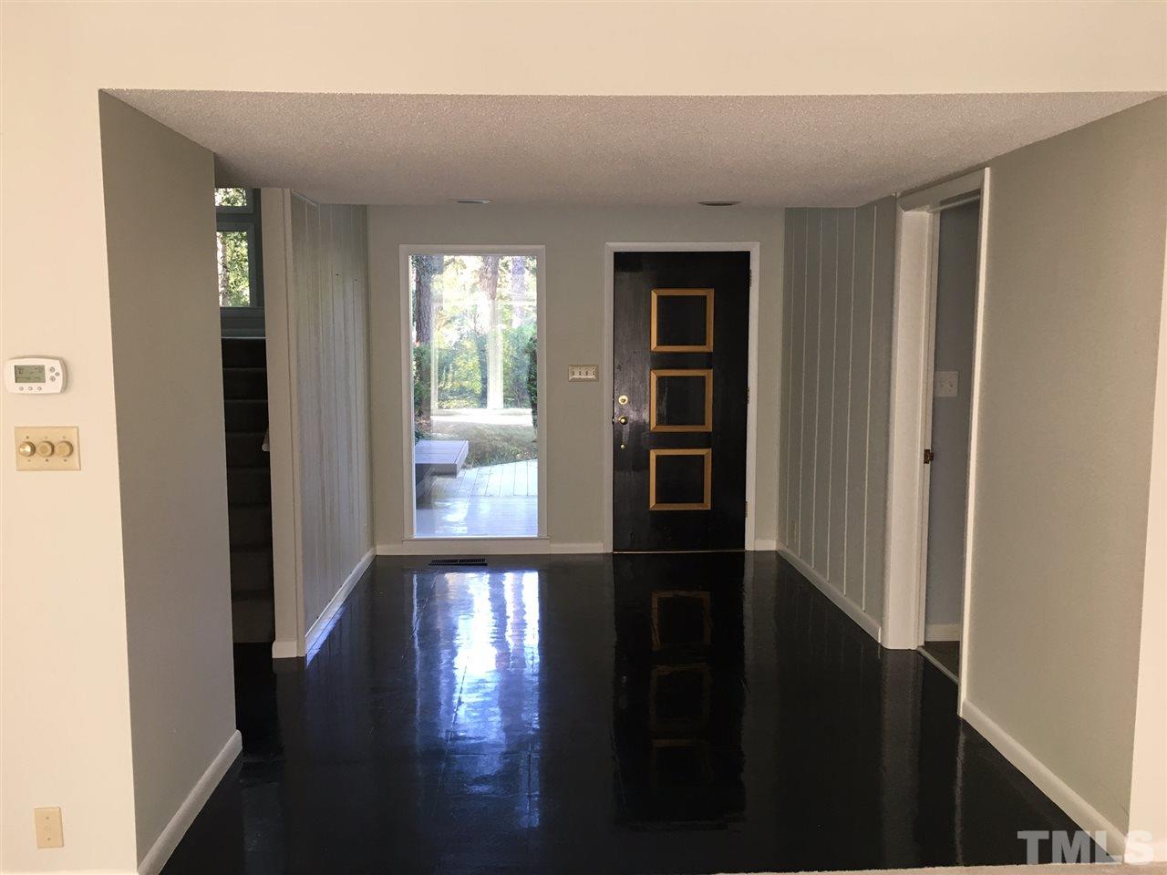 5401 Edington Lane Raleigh, NC 27604 - Photo 4 of 25 a view of hallway with wooden floor