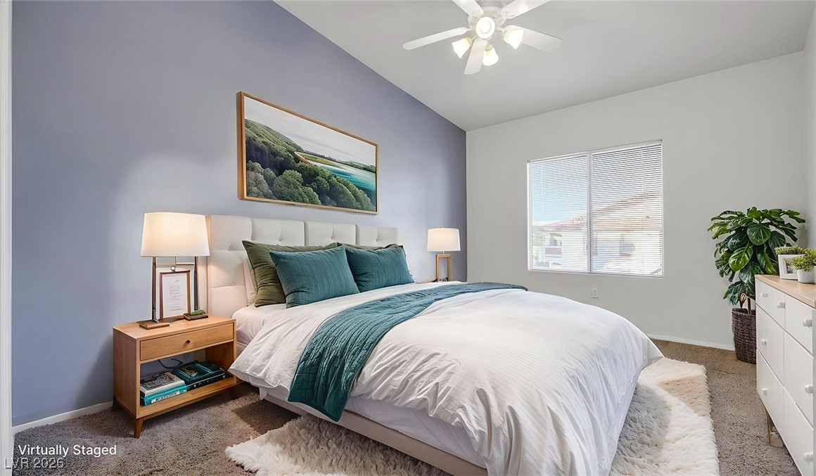 2305 West Horizon Ridge Parkway, Unit 1224 Henderson, NV 89052 - Photo 15 of 26 Virtually Staged - Carpeted bedroom featuring ceiling fan and vaulted ceiling