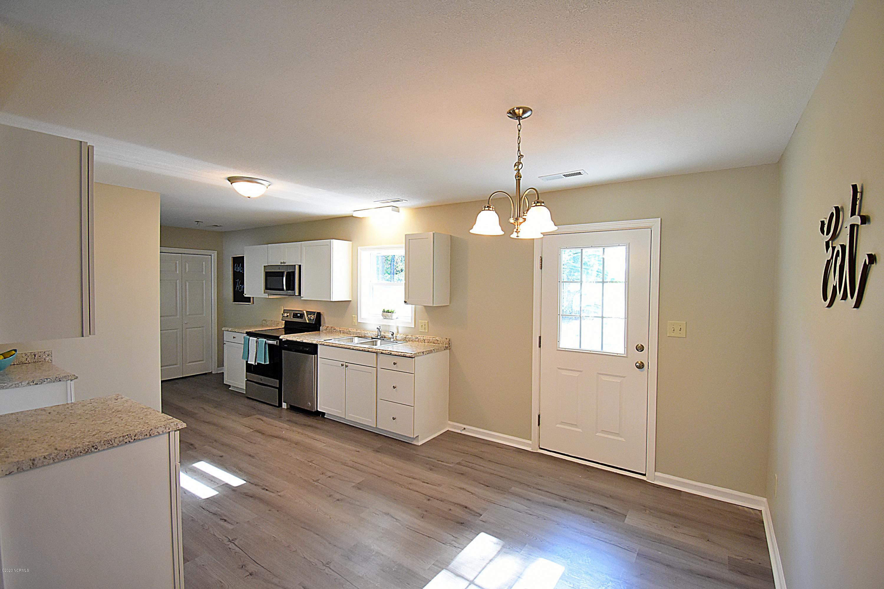 Dining area open to Kitchen