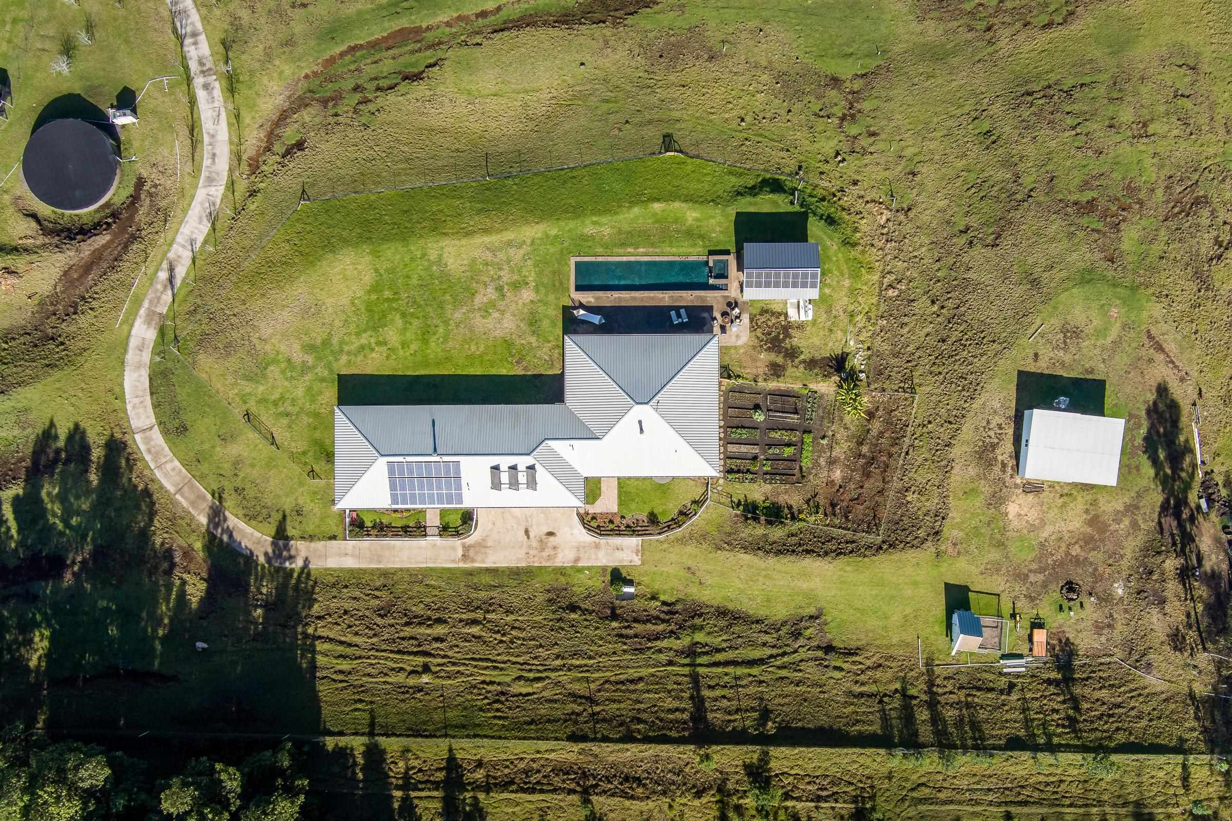 569 Hapapa Road Kula, HI 96790 - Photo 13 of 50 Water catchment, Home, pool house, chicken coop, barn.