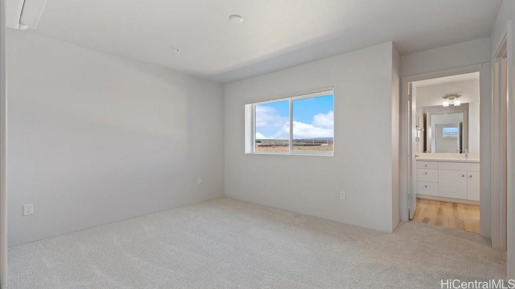 91-1170 Hoonaauao Street, Unit 1611 Kapolei, HI 96707 - Photo 11 of 24 an empty room with windows
