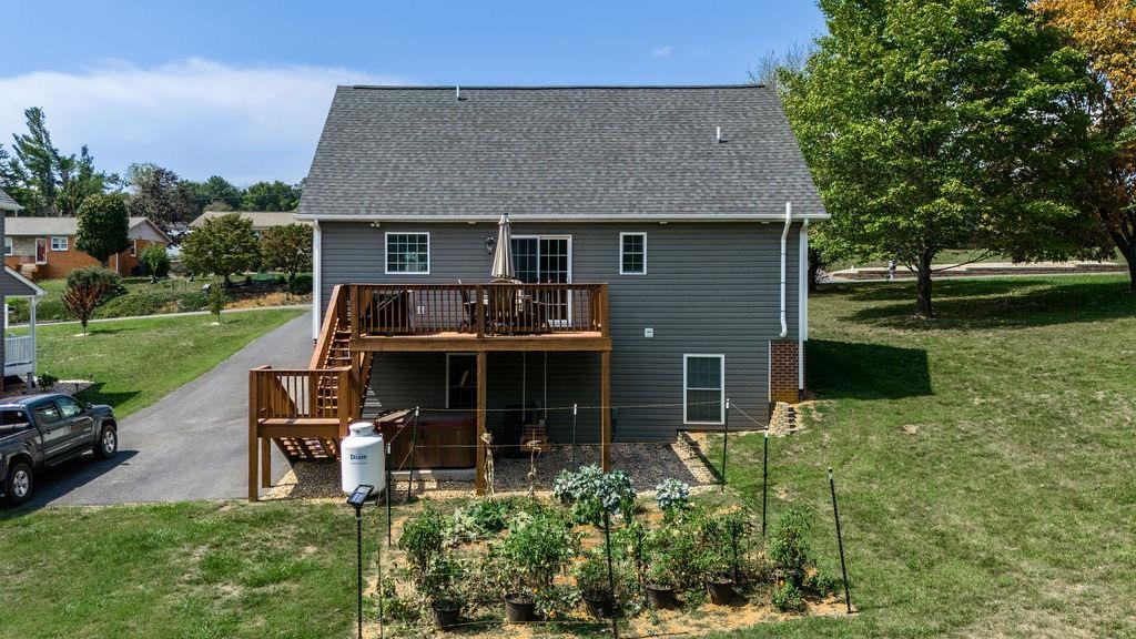 15 Rolla Mill Road Verona, VA 24482 - Photo 46 of 73 a front view of a house with garden and trees