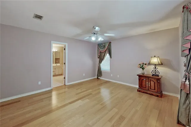 a kitchen with granite countertop cabinets and a stove top oven