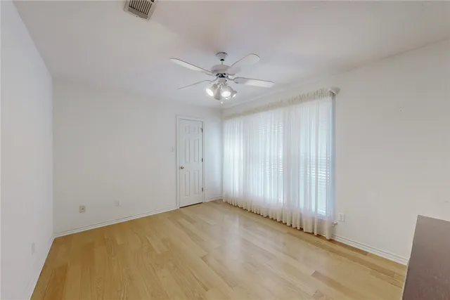 a bathroom with a sink a toilet a shower and a mirror