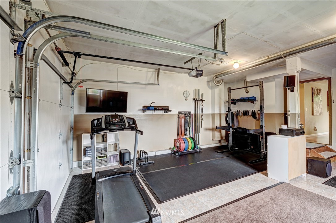 23221 13th Place West Bothell, WA 98021 - Photo 21 of 29 a room with gym equipment and a window