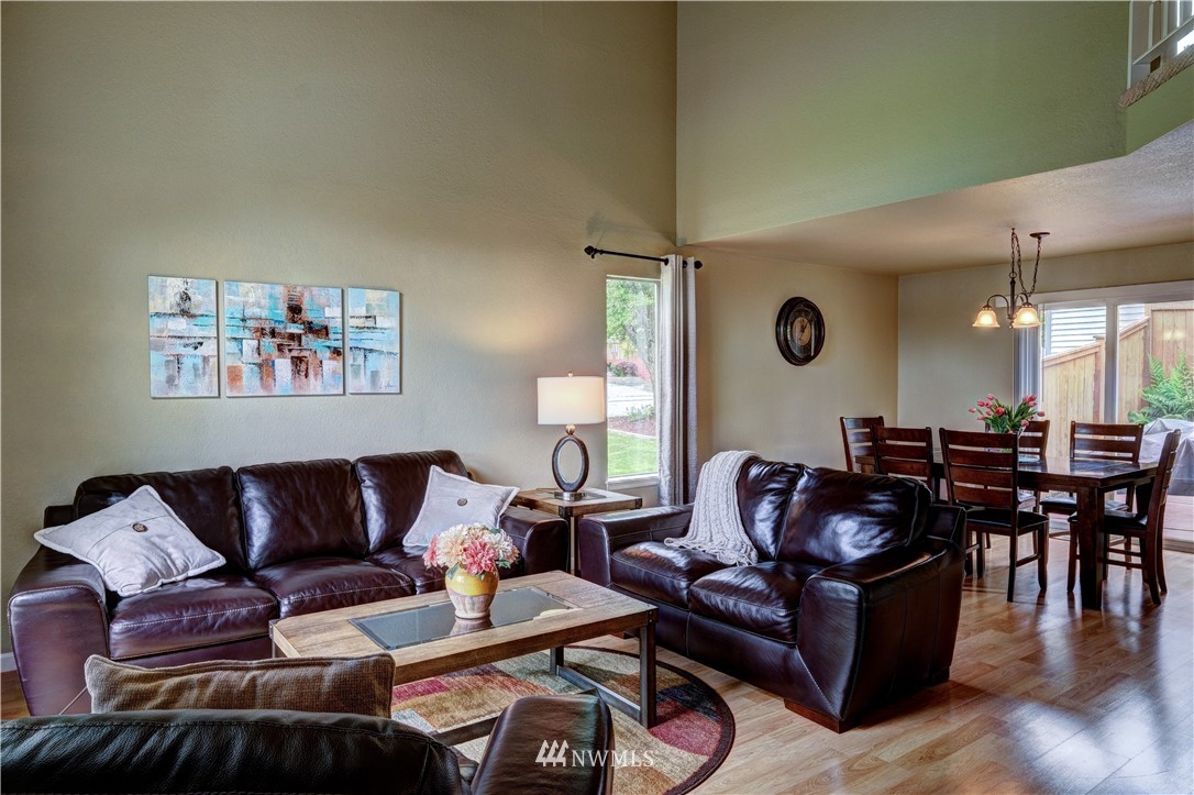 23221 13th Place West Bothell, WA 98021 - Photo 4 of 29 a living room with furniture and wooden floor