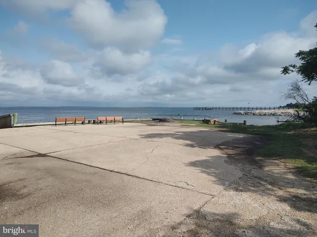 a view of swimming pool with mountain view in back