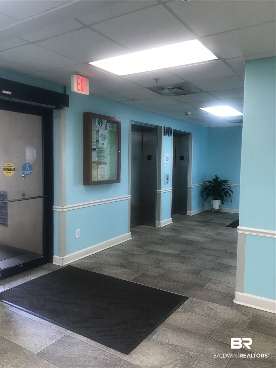 27284 Gulf Road, Unit 213 Orange Beach, AL 36561 - Photo 35 of 40 GP has a lobby w/two elevators.