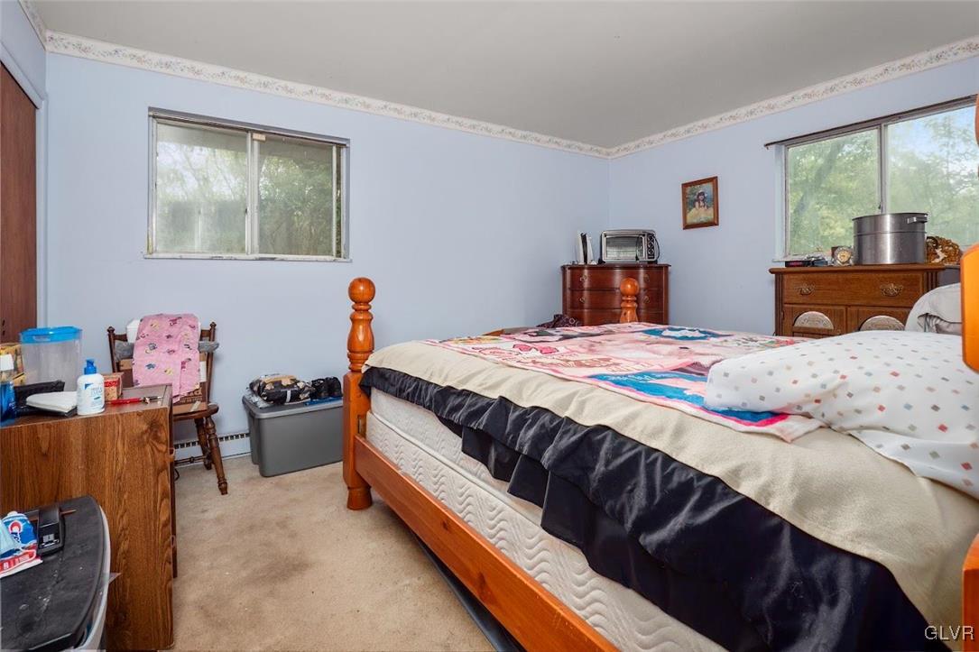 504 Heyer Mill Road Nazareth, PA 18064 - Photo 6 of 26 a bedroom with a bed and wooden floor