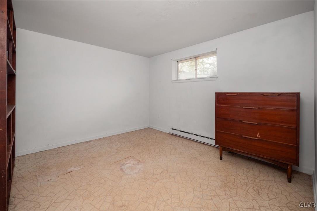504 Heyer Mill Road Nazareth, PA 18064 - Photo 10 of 26 an empty room with furniture and window