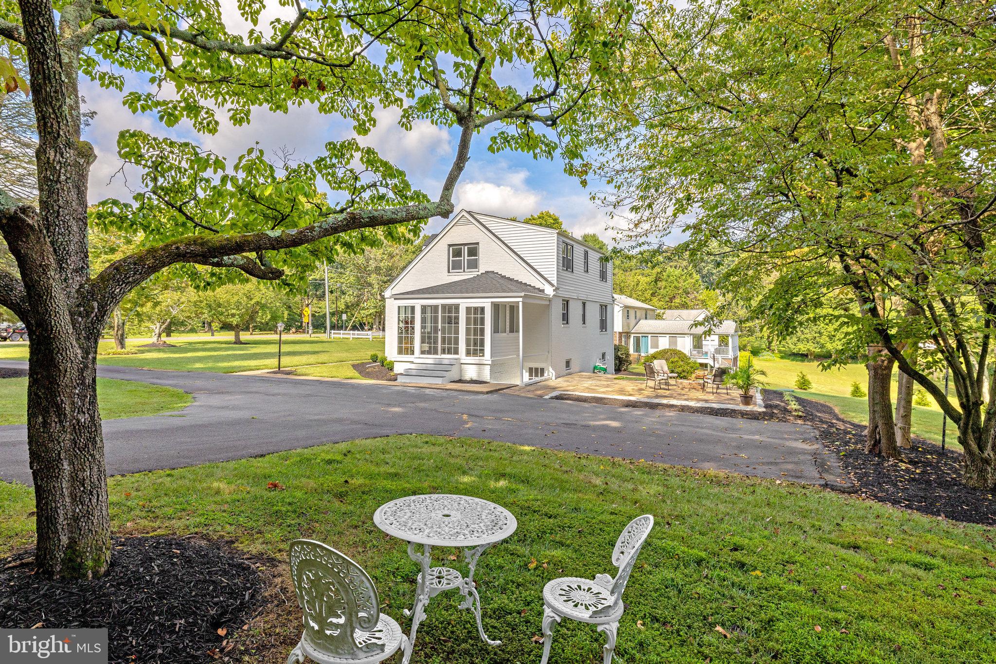 11410 Waples Mill Road Oakton, VA 22124 - Photo 57 of 62 Charming home amid lush greenery.