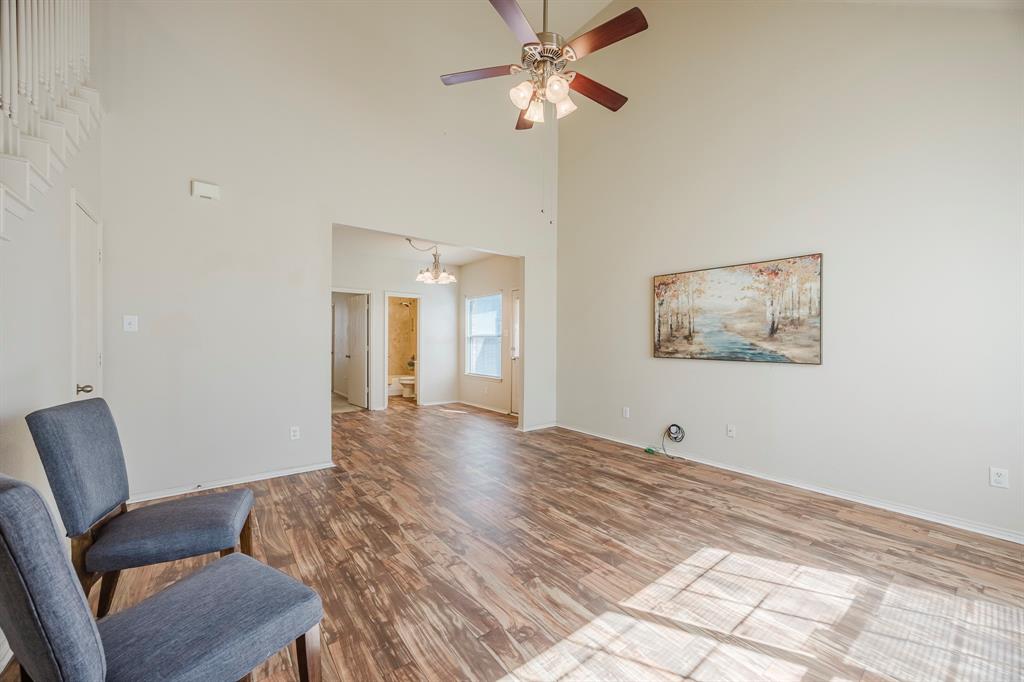 103 Janis Street, Unit B Alvarado, TX 76009 - Photo 4 of 35 a view of a workspace with furniture and a window
