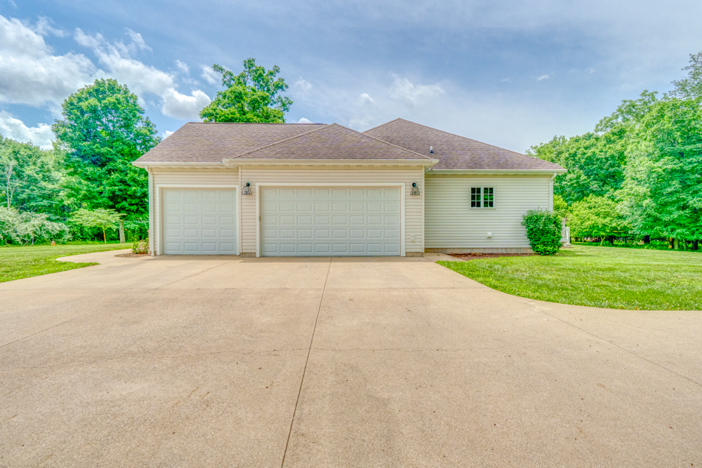 3550 East Bishop Road Mount Vernon, IL 62864 - Photo 50 of 61 a front view of a house with a yard and garage