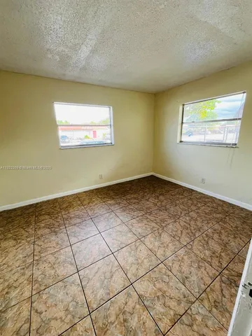 a view of a room with a window