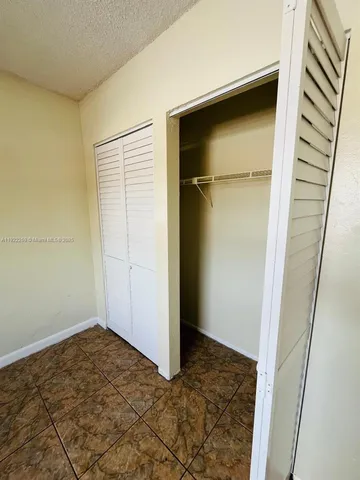 a view of a room with a window