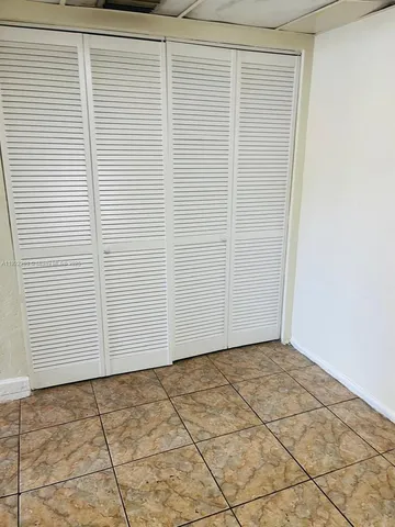 a view of a room with an empty space