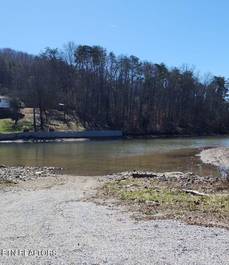 0 Emory River Road Harriman, TN 37748 - Photo 7 of 8 a view of a lake with a mountain in the background
