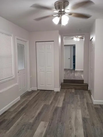 a bathroom with a shower and vanity